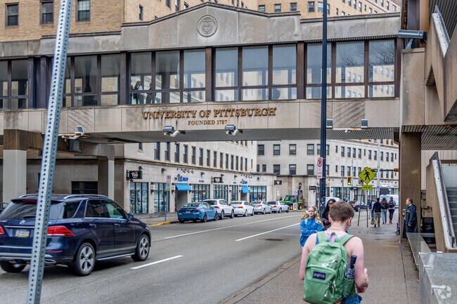 The famous Pitt walkway over Forbes near West Oakland.