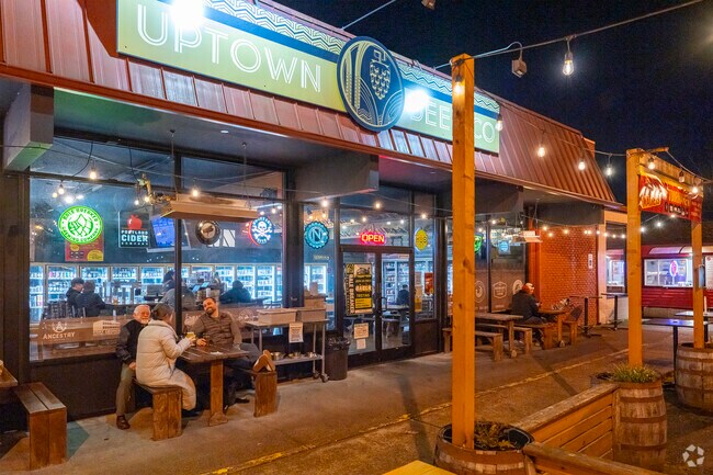 Residents enjoy an extensive list of craft beers and a Mid City Smash Burger at Uptown Beer Co.
