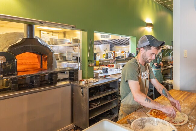 Basil Wood Fired Kitchen near Muncy Creek offers wood-fired pizza and seasonal dishes.