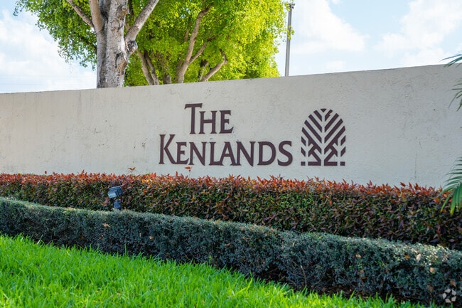 The Kenlands sign marks the entrance to Kenland Boulevard, welcoming residents and visitors alike.