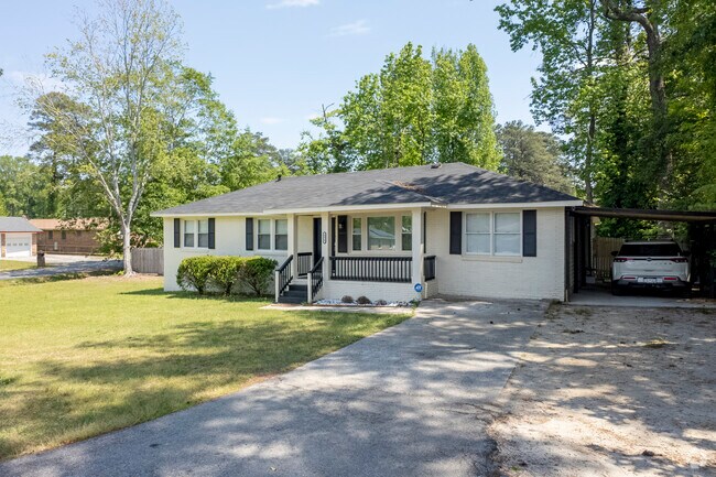 Some residents choose to enclose the carport of their bungalows to create more living space.
