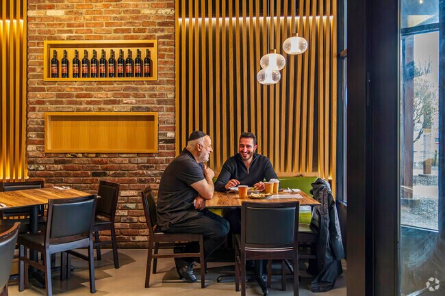 A beautifully restored town landmark, Al Di La Pizzeria is a town favorite in Wesley Hills.