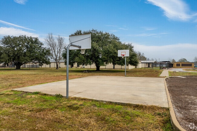 Students of Hull-Daisetta Elementary can play basketball on the paved courts.