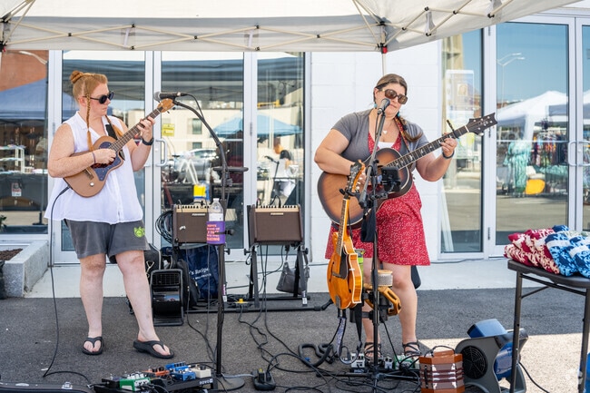 Treat your senses to music, food, and crafts at Fall River Market, MA.