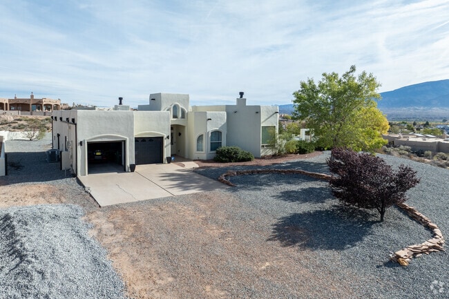 Tampico property offers a spacious lot with a Southwest-style home and scenic backdrop.