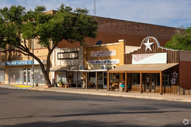 Charming downtown Pecos opening up shop on a bright early morning.