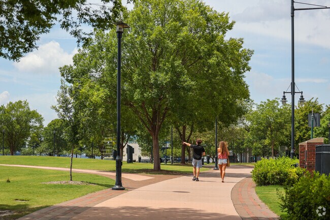 Downtown Norfolk residents enjoy a stroll through Town Point Park.