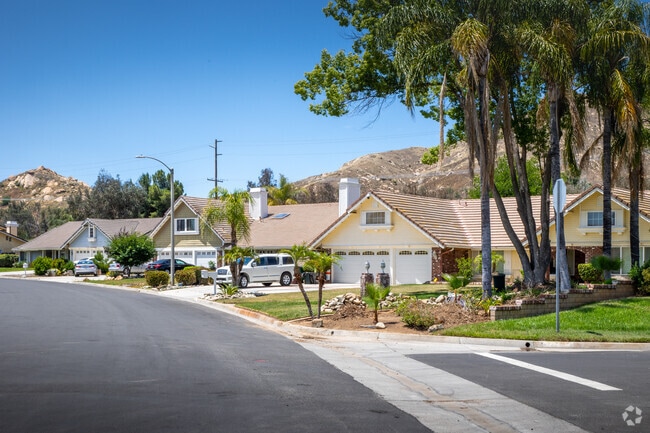Tall trees give shade to a Moreno Valley neighborhood.