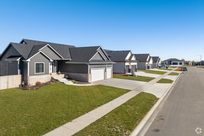 It is common to find homes in Northeast Wichita with sidewalks running through the front yard.