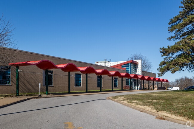 A local school near Beverly Hills features Googie architecture and a wavy awning.