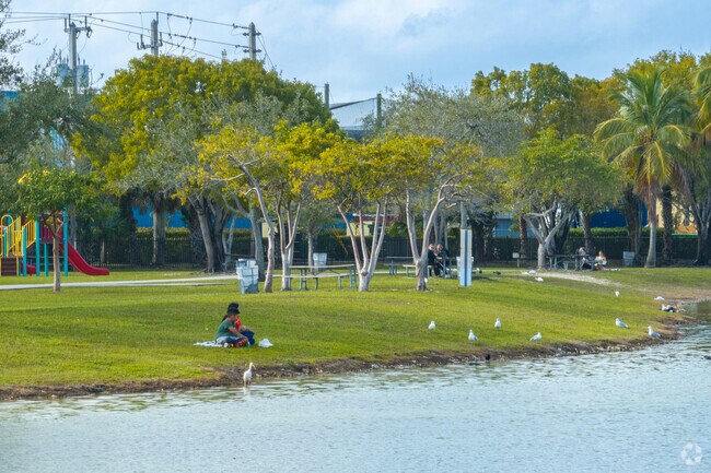 Residents often relax by the pond in Fontainebleau Park West.