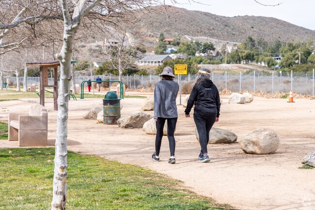 Acton Park offers scenic mountain views along its peaceful walking trails.