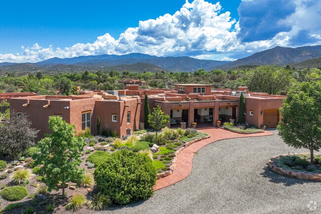 Large, Santa Fe-style homes can be found on large lots with views of the Sangre de Cristos.