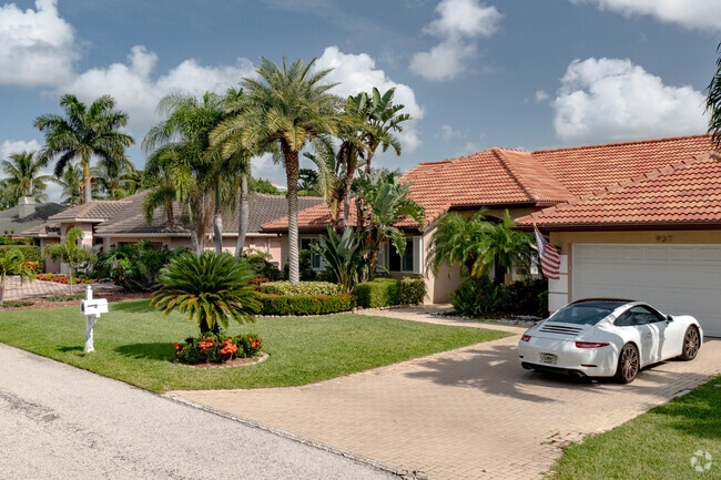 Multiple home types line the streets of the Tropic Isle neighborhood in Delray Beach, FL.