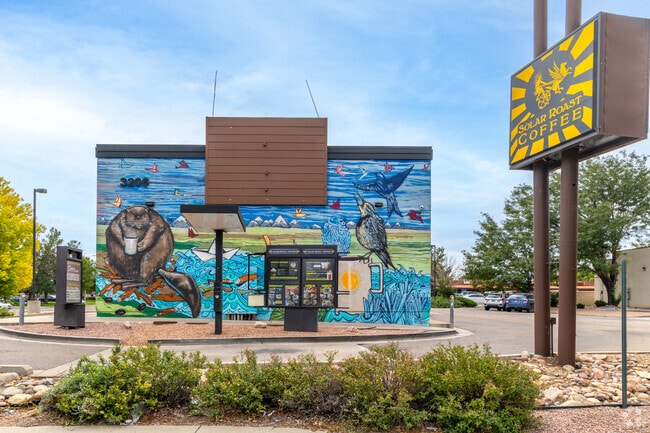 A beautiful artwork decorates the side of Solar Roast Coffee in Heritage.