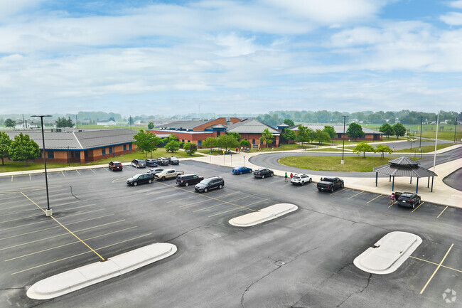 The sizable main lot in front of Woodland Meadows is shared with Harvest Elementary in Saline.