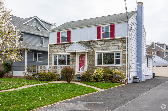 A view of some of Millburn's delightfully colorful Colonial style homes.