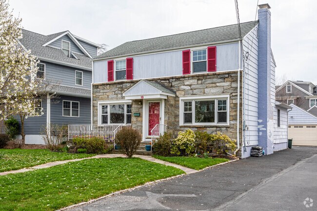 A view of some of Millburn's delightfully colorful Colonial style homes.