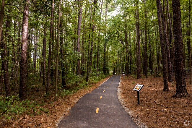 Rock Quarry Park has a nice walking path leading to a dog park.