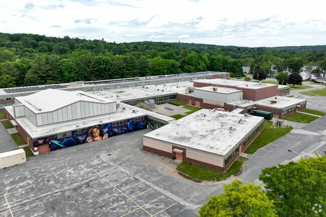 There is a large mural by the parking lot at Forest Grove Middle School.