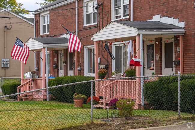 Many homes in West Mayfield come with a small front porch which locals usually decorate.