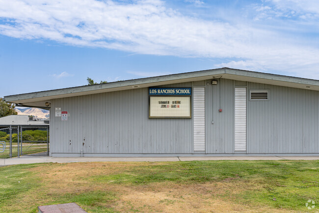 A large marquee at the front of Los Ranchos Elementary School informs parents of events.