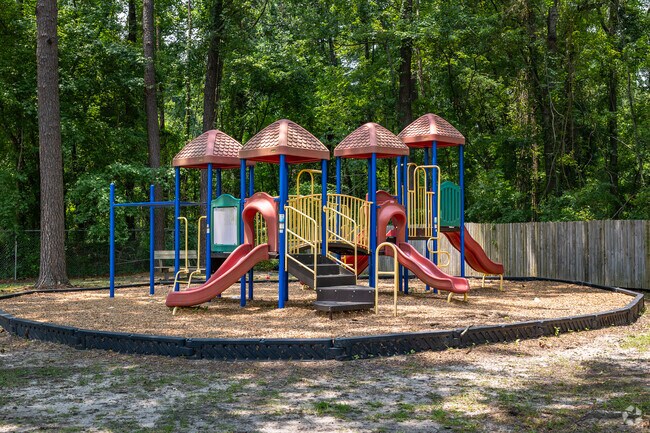 Kids enjoy the playground at Collins Park in North Charleston.