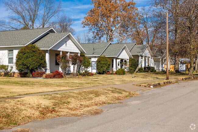 Older homes line a residential street in Lincoln.