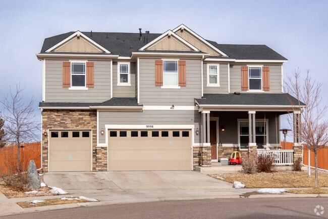 This large craftsman home in Sierra Ridge boasts a three car garage and a smaller front yard.