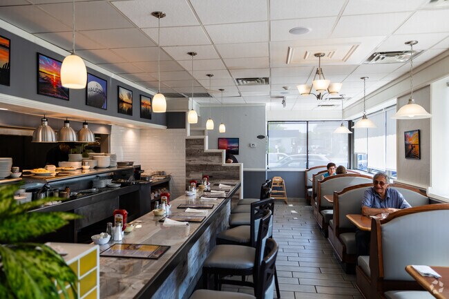 Partake in an appetizing brunch at Honeybella Pancakes & Cafe near Robert Meadow Hill.