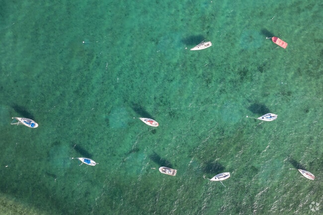 The clear blue waters of Grand Traverse Bay draw in visitors to Greilickville year-round.