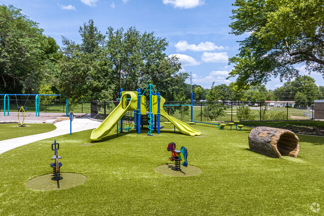 Kids play on the playground during their recess at Butcher-Greene Elementary.