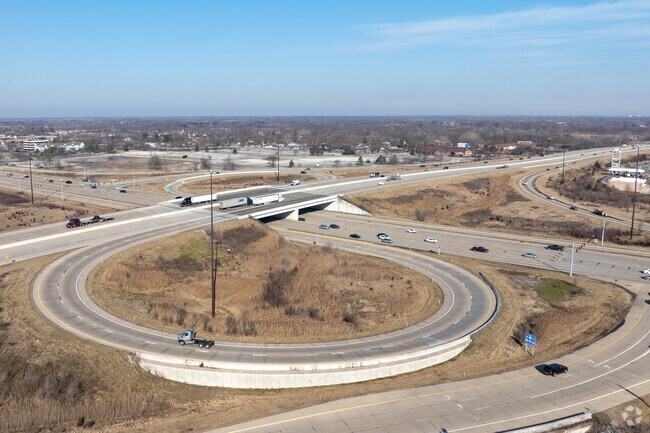 I65 runs right by New Elliott to Chicago north and Indianapolis south.