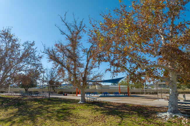 Students can enjoy outdoor seating in this open air concept campus at Cholla High School