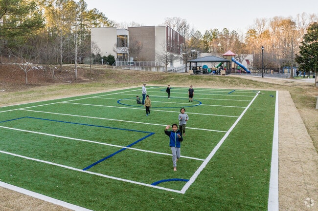 Mason Mill Park features open fields and forested boardwalk trails.