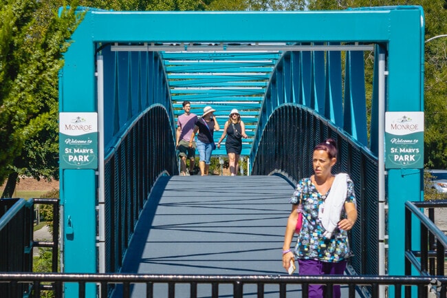 St Mary's Park rests on the other side of the River Raisin from downtown Monroe.