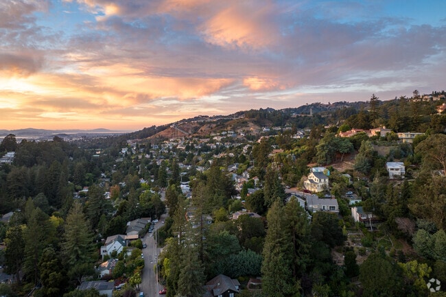 Picturesque sunsets and views await you in the Merriewood neighborhood of Oakland.