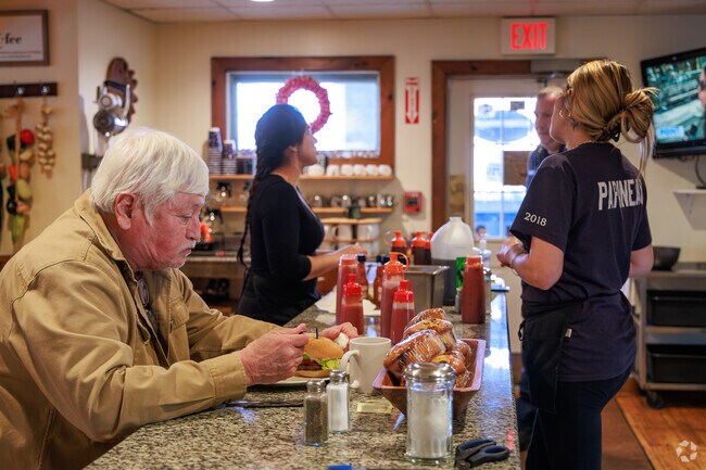 A man eats his lunch at Sweet Grass Diner in Nedrow.
