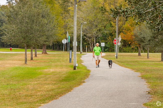 Even the fur babies love a nice walk on the 10-mile Good Neighbor Trail in Brooksville.