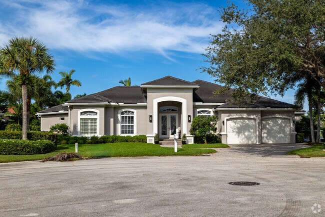 Modern ranch home at Egret Landing in the North Palm Beach Heights community.