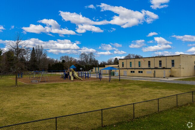 Playgrounds fill with laughter at John F. Kennedy Elementary School.