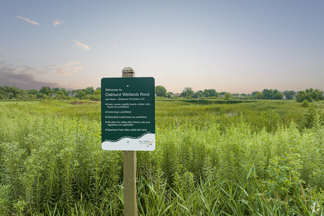 Residents enjoy taking in the scenic beauty at the Oakhurst Wetlands Pond.