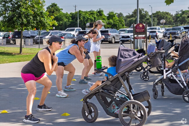 Young mothers do cardio at Boerne City Park.