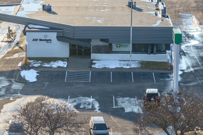 Regis Catholic Schools shares a building with a bank.
