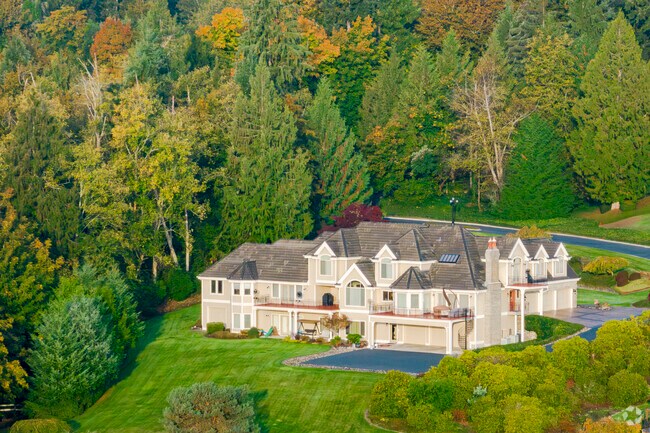Large contemporary homes sit in the hills of Wauna, Washington.