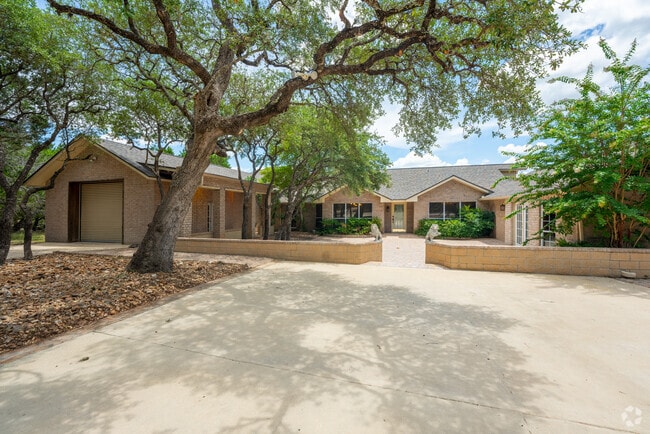 Many homes in Lakehills boast large, shaded driveways.