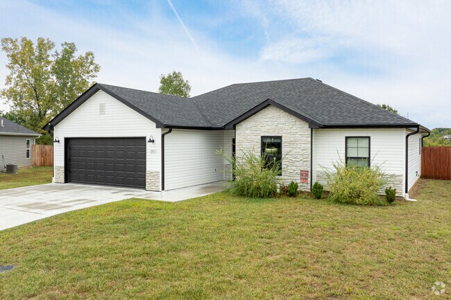 New traditional ranch homes are common in the newer sections of Hominy Branch.
