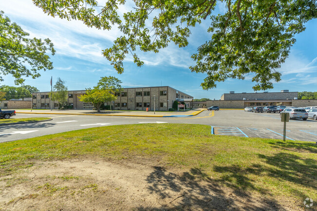 Parking and one of the entrances Robert Frost Middle School.