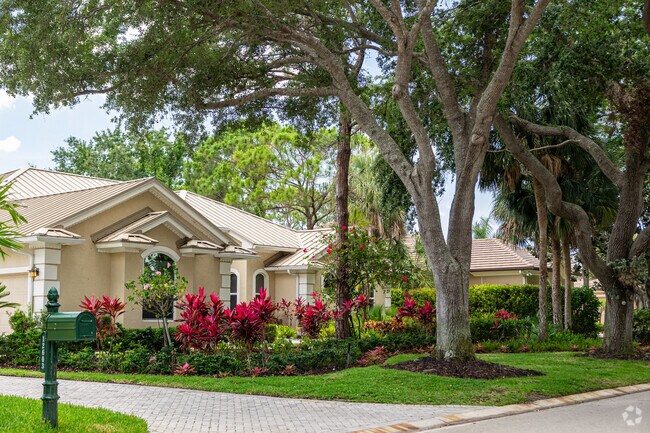 Homes in Remington Reserve are shaded by mature trees and feature colorful landscaping.