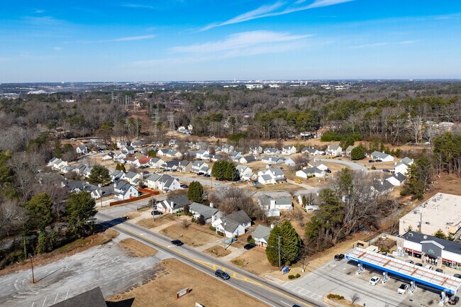 The real estate market in Conley offers a mix of single-family homes, townhouses, and manufactured homes in a forest setting.